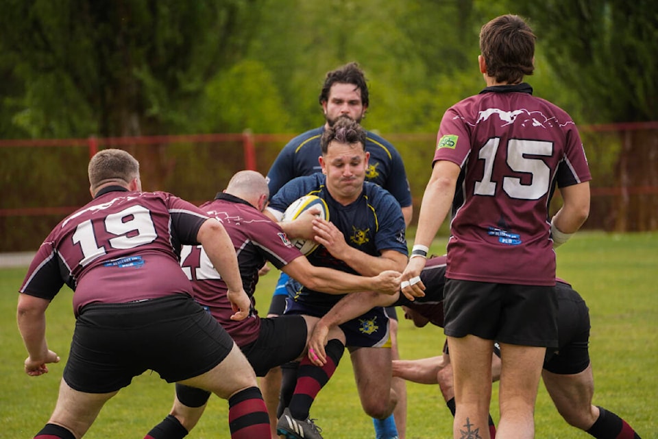 Teddy Tooke running into contact with Max Gibbons following behind during B.C. Rugby’s Division 3 Final at the Burnaby Lake Rugby Club on Saturday May 4, 2024 (Photo Courtesy/Jessica Sterkenburg) 