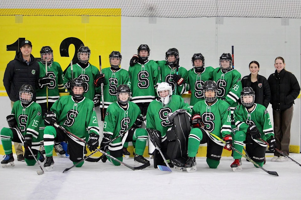 Jeff Grenier (upper left) with the first all-girls Sardis Hockey Academy class following the Eastern Fraser Valley’s first-ever women’s high school hockey game at the Sardis Sports Complex on Thursday ,May 2. (Submitted photo) 
