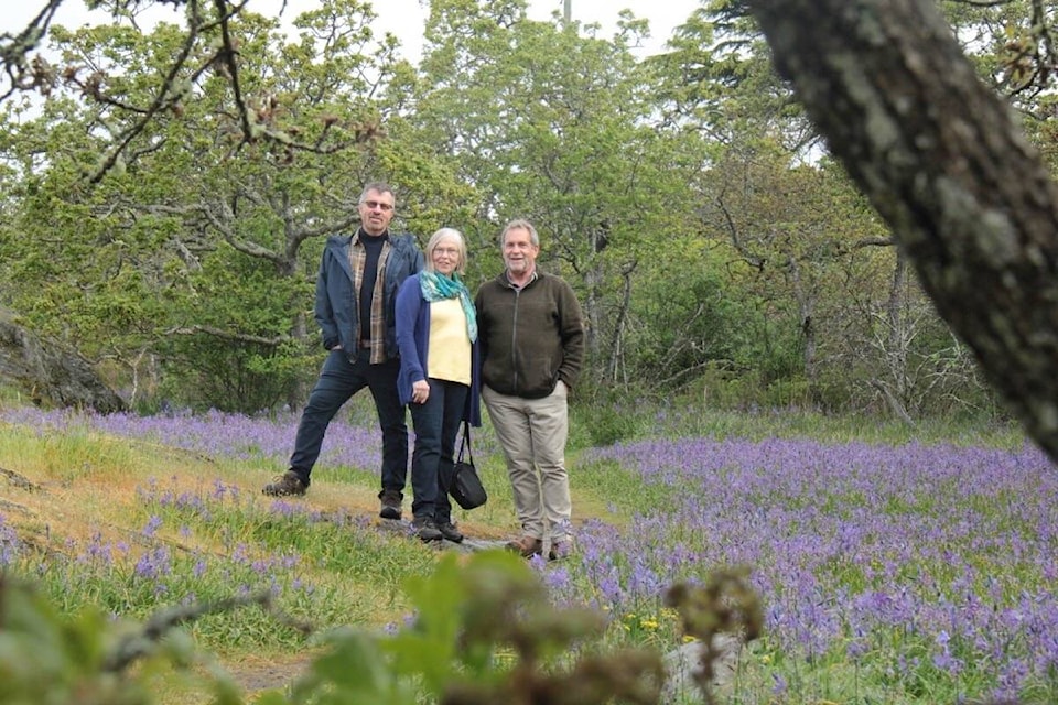 Wylie Thomas, restoration biologist, volunteer Margaret Lidkea and Oak Bay parks manager Chris Hyde-Lay stand in Uplands Park, home to the highest concentration of rare species in Canada, including 26 endangered or threatened plant species and one type of bumblebee. (Christine van Reeuwyk/News Staff) 