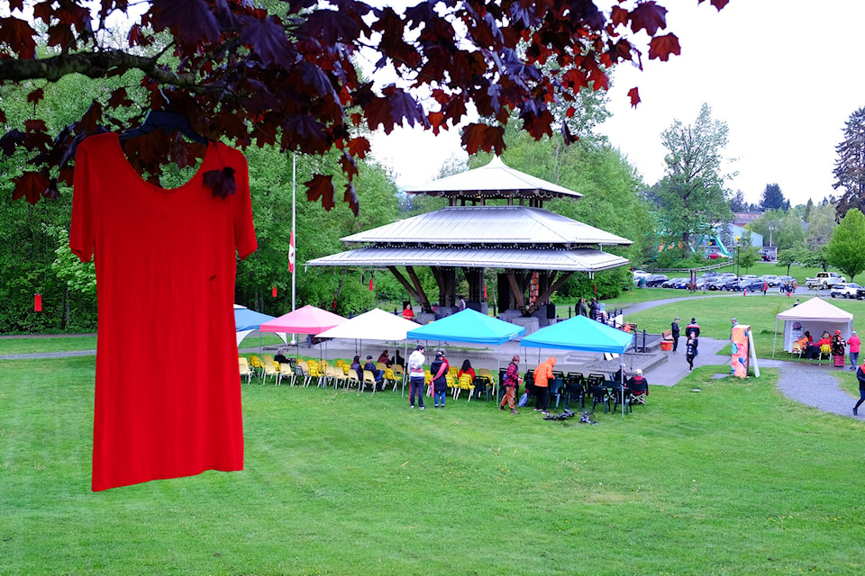 A red dress hangs at Simms Park Sunday (May 5) at the Red Dress Day ceremonies. (Olivier Laurin / Comox Valley Record) 