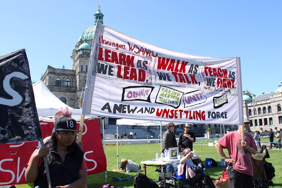 Residents of Vancouver’s Crab Park encampment and allies held a demonstration at the B.C. legislature on May 8 with an aim of having their voices heard by MLAs. (Jake Romphf/News Staff) 