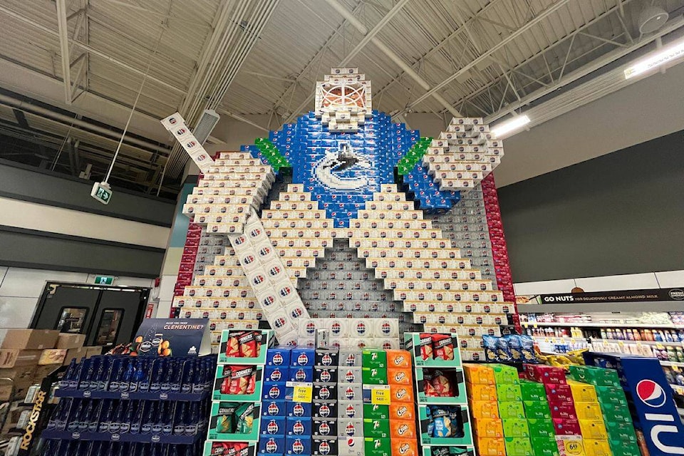 Canucks goalie and Marvel characters on display at Orchard Plaza Save-On-Foods in . (Jacqueline Gelineau/ ) 