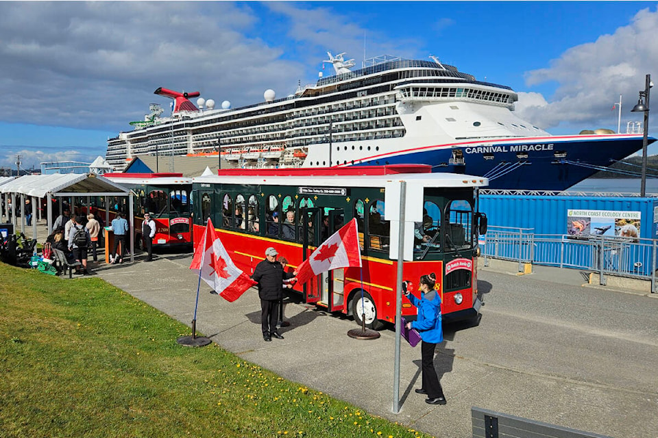 Passengers from the cruise ship Carnival Miracle line up for tours with the Olde Time Trolly Company in Prince Rupert May 1. (Thom Barker/The Northern View) 