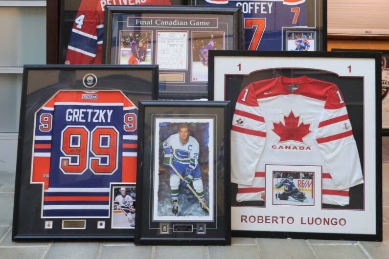 Coquitlam RCMP is looking for additional victims after police recovered more than $50,000 worth of sports memorabilia that was stolen from a storage locker. (Coquitlam RCMP handout) 