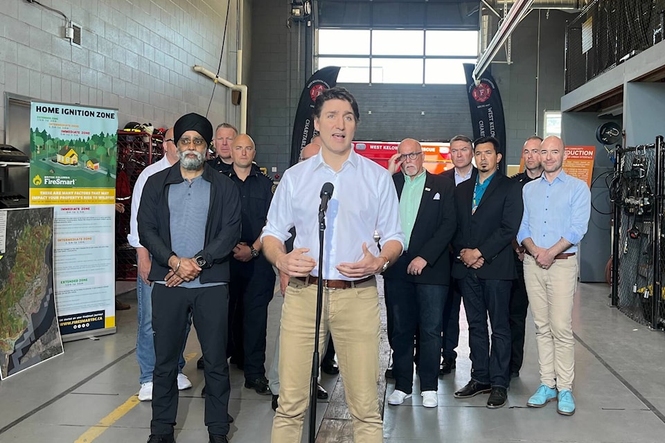 Prime Minister speaks to reporters during a visit to West Kelowna Fire Hall #31 to meet with first responders and elected officials. (Jacqueline Gelineau/Capital News) 