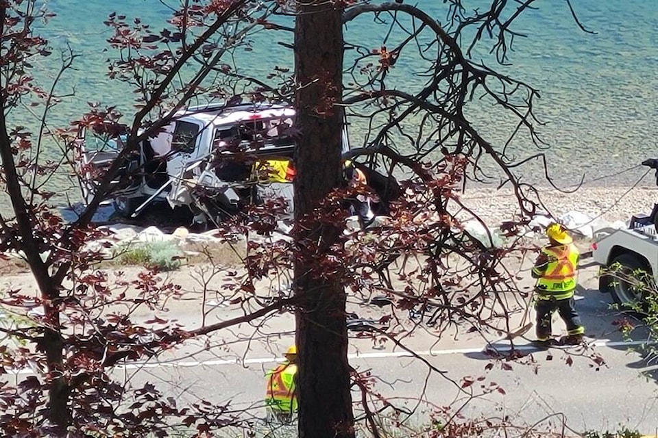 Emergency crews pull a vehicle from Okanagan Lake following a multi-vehicle crash on Highway 97 near Renfrew Road in Peachland on May 10, 2024. (Photo Bill Castel) 