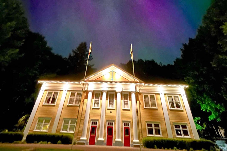 Reader Tara Johnson Hawkins took this photo of the Northern Lights shimmering over the historic community hall in Fort  on Friday, May 10. (Special to ) 