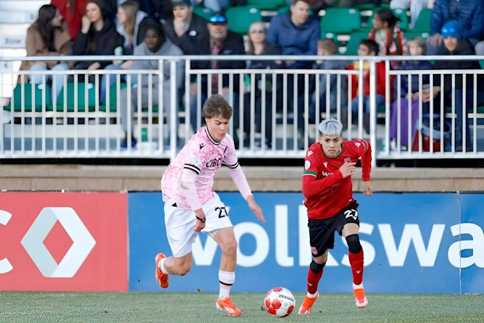 Vancouver FC’s Grady McDonnell goes for the ball against Cavalry FC’s Diego Gutiérrez Friday, May 3, on ATCO Field. Calgary won 3-1. . (CFC Media/Tony Lewis\Special to Langley Advance Times) 