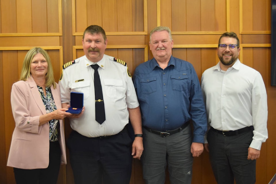 From left to right: ACRD vice-chair Debbie Haggard, Sproat Lake Fire Chief Mike Cann, regional fire services manager Charlie Starratt and ACRD CAO Daniel Sailland. (ELENA RARDON / Alberni Valley News) 