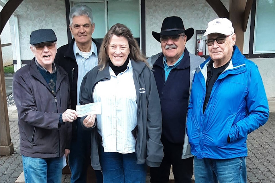 Knights Of Columbus (L-R) Phil Riley, Cec Afonso, Larry Jangula and Arnold Lamb presented a $500 cheque to Siobhan McCulloch-Orr of the Comox Valley Recovery Centre for outdoor tables. A tour of the very impressive facilities was also conducted by Mr. Albert (Butch) Montreuil 