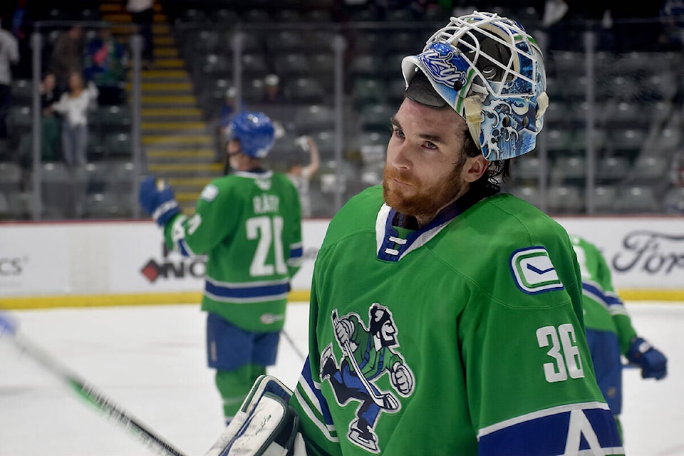 Abbotsford Canucks goalie Zach Sawchenko salutes the fans after his team’s 4-3 loss to the Ontario Reign in game three. (Ben Lypka/Abbotsford News) 
