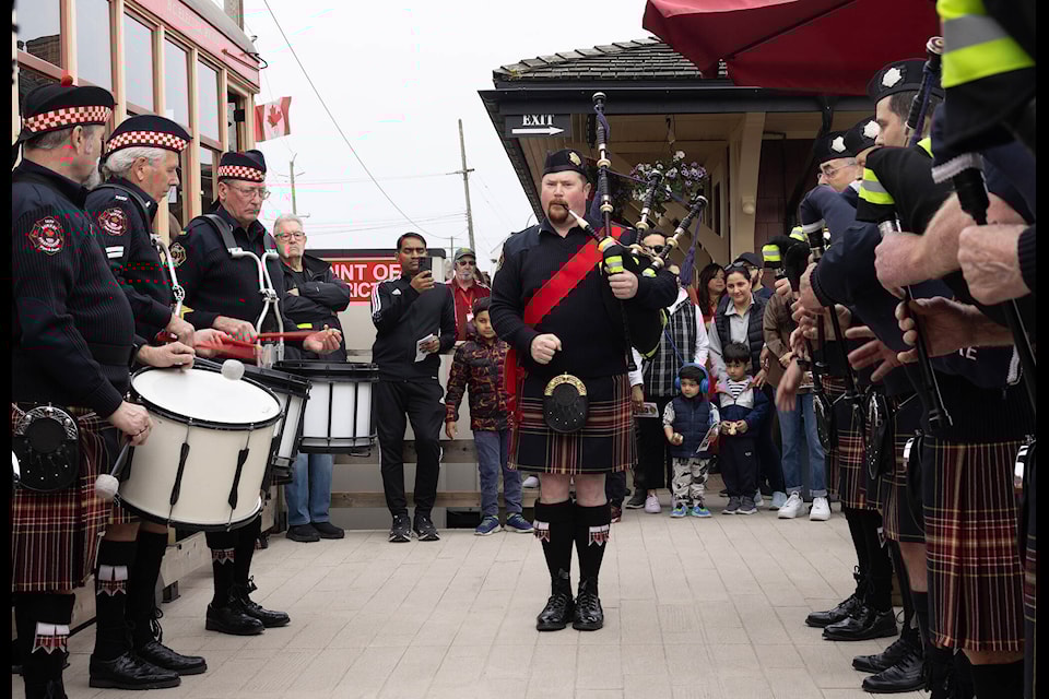 The Surrey Firefighters Pipe and Drum band performs for visitors during opening day festivities for the Fraser Valley Heritage Railway Society’s 2024 season. (Photo: Jason Sveinson) 