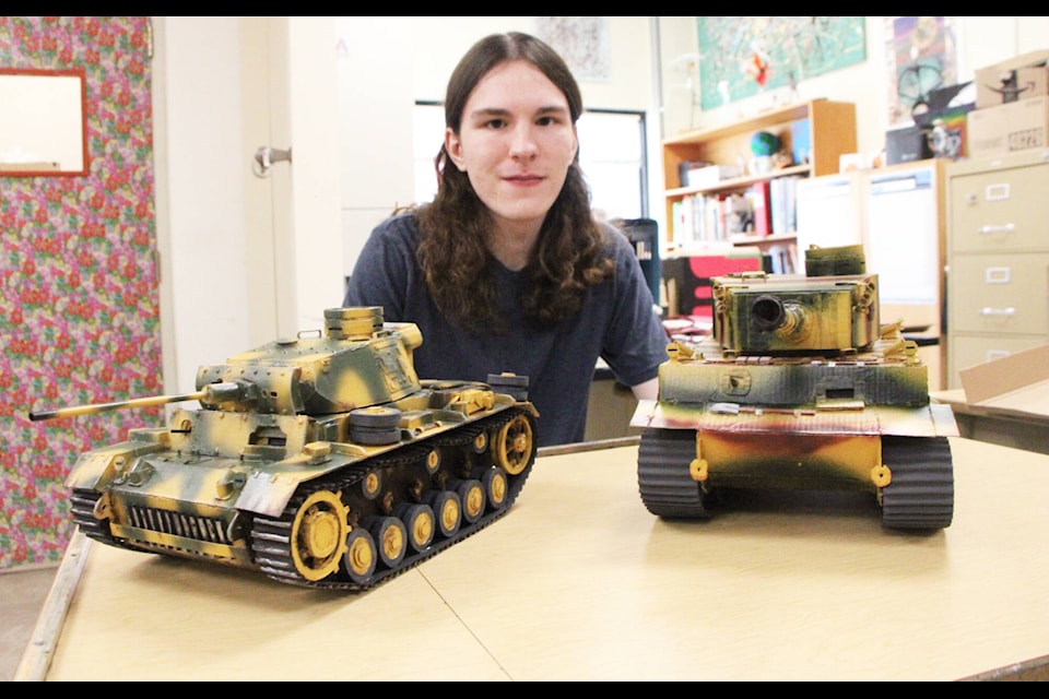 Jacob Stadnyk has spent years building model tanks and ships, such as this Panzer 3L and Tiger HL, out of cardboard using nothing but his own ingenuity and references. (Patrick Davies photo - simplymastery) 