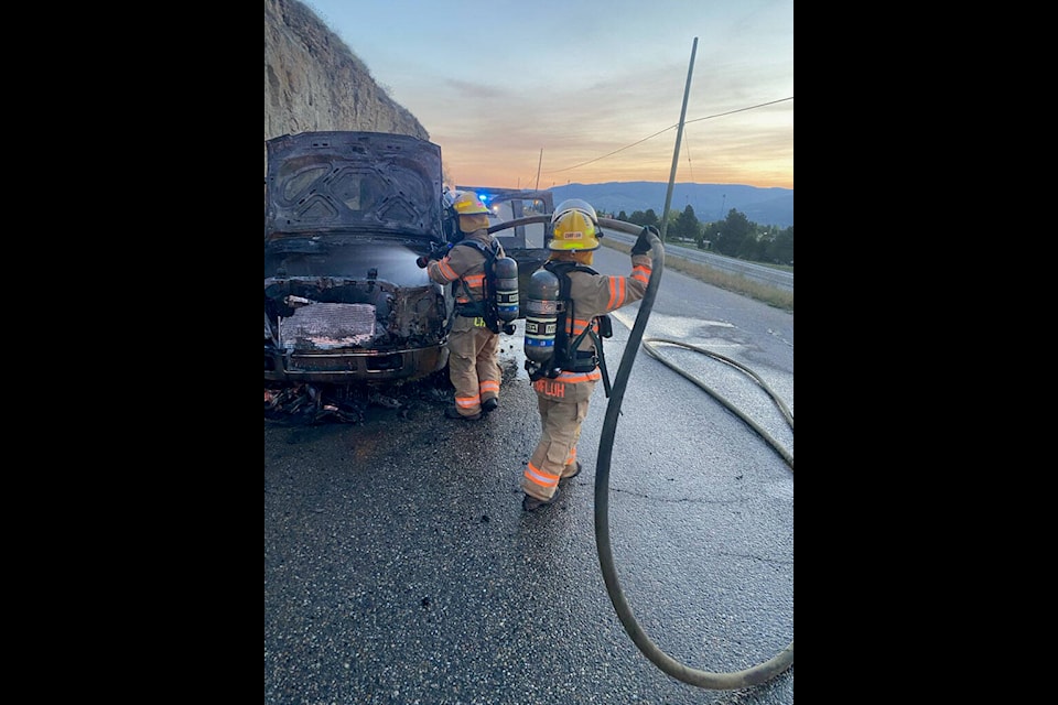 Coldstream Fire Department members clean up the aftermath of a vehicle fire on Clerke Road which was called in at 4:25 a.m. Thursday, May 9. The vehicle, a pick-up, was found abandoned and fully engulfed when firefighters arrived. (Coldstream Fire Department photo) 