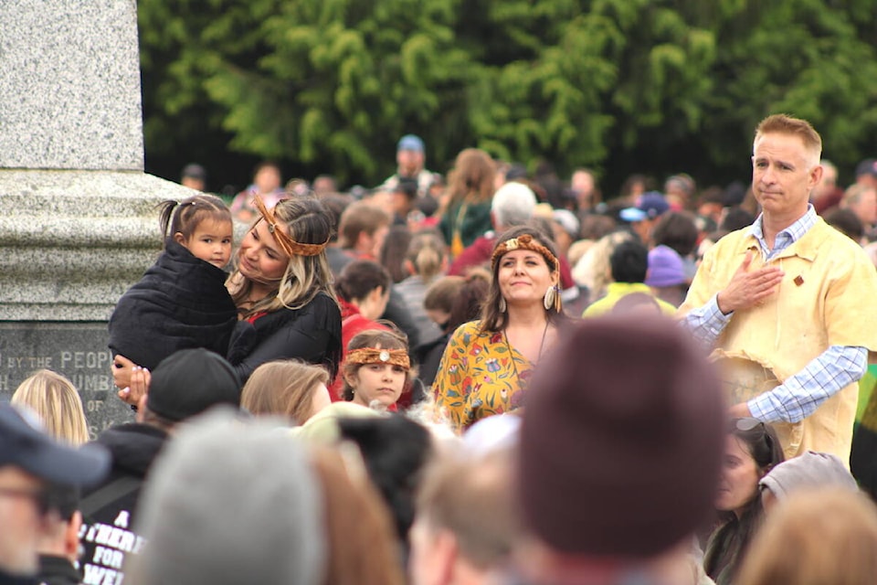 Raven Lacerte, co-founder Moose Hide Campaign, holds her daughter as the campaign spurred a large march in Victoria on May 16. The campaign aims to eradicate violence. (Jake Romphf/News Staff) 