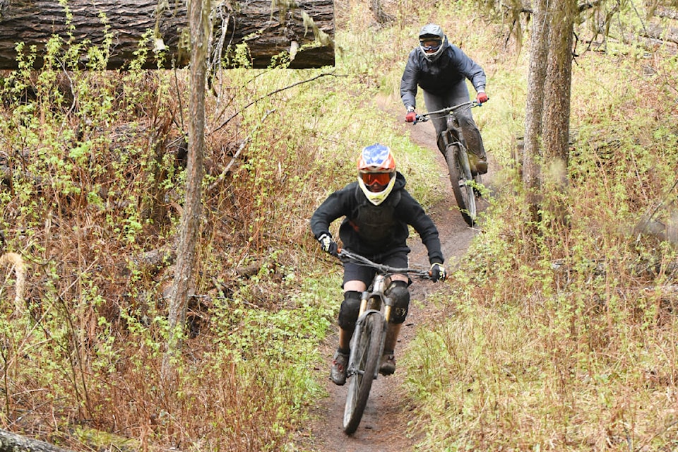 Riders pre-ride the course on May 7 for the first of three downhill mountain bike races set for the Spring in Williams Lake. (Ruth Lloyd photo - Williams Lake Tribune) 