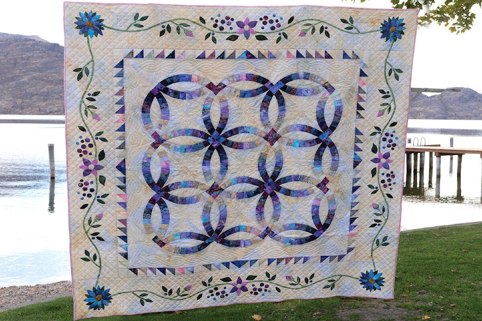 web1_240517-wek-quilts-on-beach-pincushionquilt_1
