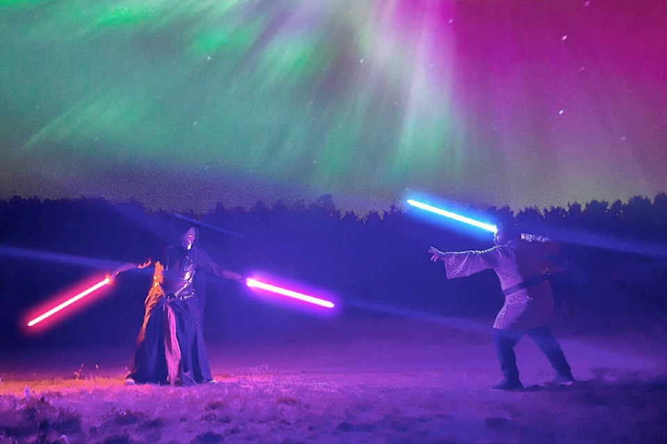  Surrey resident Kyle Timmons and his friend dressed as a Jedi and Sith lord put on a show at Aldergrove’s Twilight Drive-In theatre for May the 4th. (Special to The Star)  