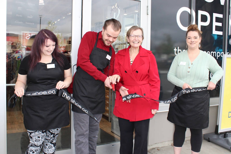From left to right: Courtney Brossoit, Jordan Simister, City Councillor Cindy Solda and Shamane Manyk cut the ribbon the celebrate the grand opening of The Shoe Co. (SONJA DRINKWATER / Special to the AV News) 