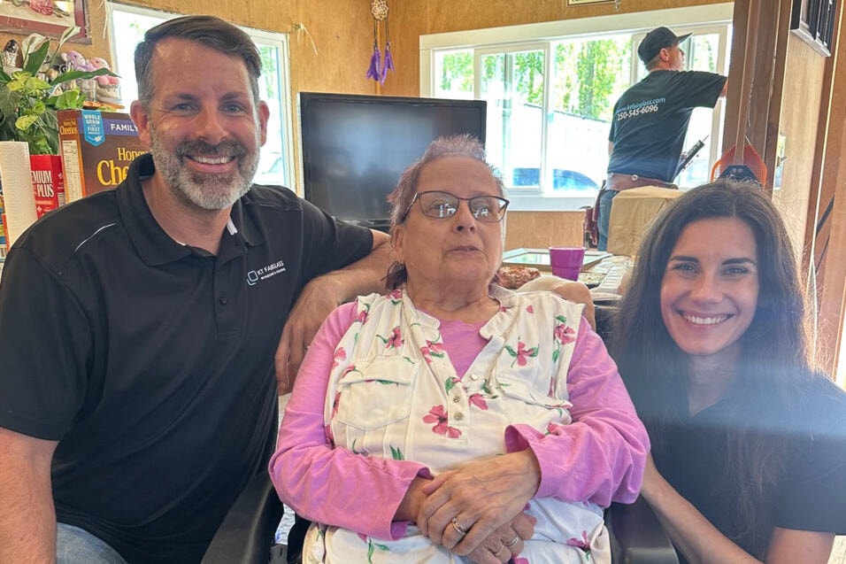 KT Fairglass Windows and Doors owners Todd and Kate Embley with Lumby’s Vi Cox (centre). The Vernon company helped lead a major retrofit of Cox’s windows and trailer home through their Community Give Back Project. (Contributed) 