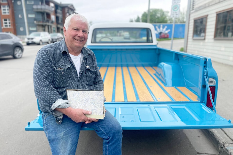 Don Kunka sits on the tailgate of his beautifully restored 1972 Chevrolet CST pickup truck. (Ruth Lloyd photo/Efteen) 