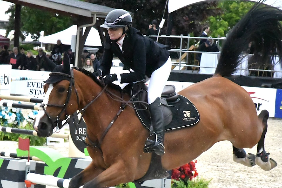  Erynn Ballard, from Ontario, riding Nikka VD Bisschop came first place in the Major League Show Jumping Grand Prix at Thunderbird Show Park on Sunday, May 26. (Kyler Emerson/Aldergrove Star) 