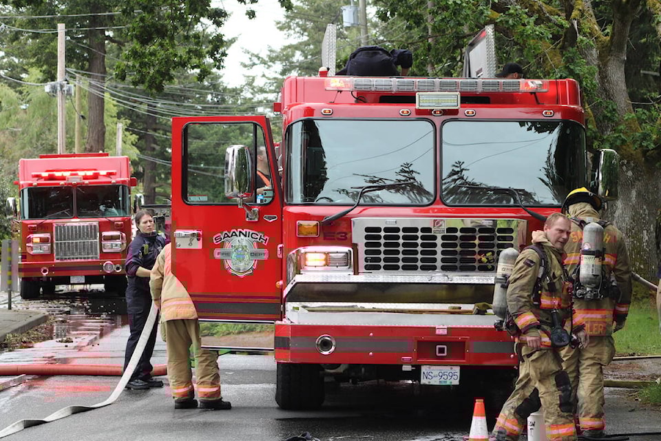 Saanich firefighters quashed a blaze at an apparently vacant Gordon Head home on May 27. (Jake Romphf/News Staff) 