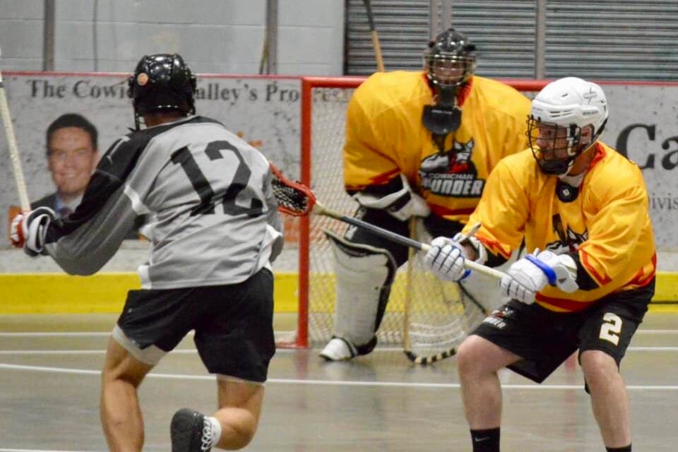 Chris Claxton of the Cowichan Thunder marks his man during the Thunder’s 10-6 win over the Tugmen on Saturday, May 25. (Paula Harris photo) 