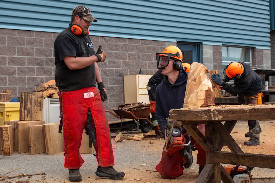Students in the Rutland Secondary School Forestry Program learn from Tyler Welfing on May 29. (Justin Schneider/Central Okanagan Public Schools) 