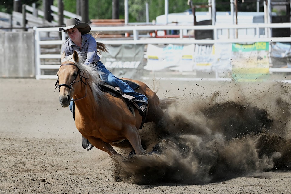Elexa Langset from Savona comes into a turn around one of the barrels at the Keremeos Rodeo with speed on May 19. (Brennan Phillips - Keremeos Review) 