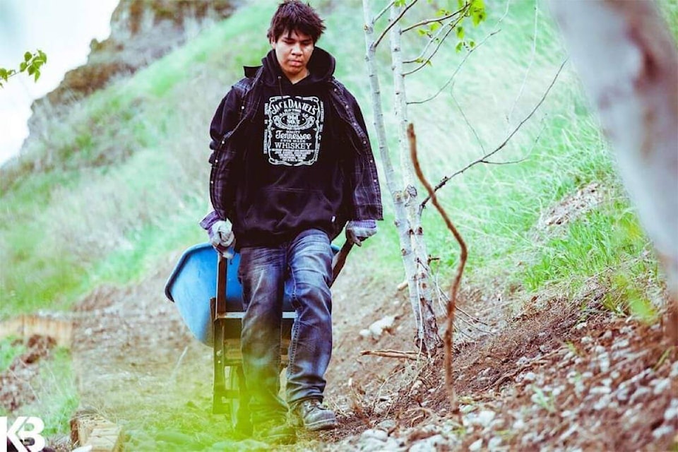 The late Leeland Alexander seen here as part of the bike trail building crew at Xat’sull First Nation. (Photo submitted) 