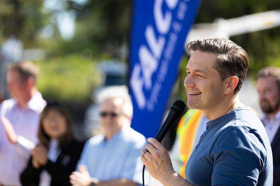 Pierre Poilievre speaks to a crowd of employees and supporters during his visit to Falcon Equipment in Surrey on Wednesday, May 15, 2024. (Photo: Anna ) 