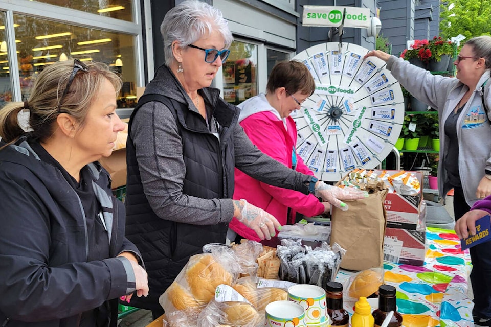 Employees of the Aldergrove Save-On-Foods were selling homemade beef brisket sandwiches to raise funds for BC Children’s Hospital on Saturday, May 25. (Kyler Emerson/Aldergrove Star) 