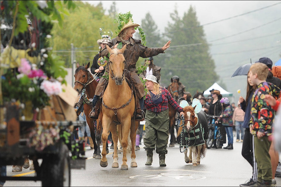 Thousands of people lined Yarrow Central Road to take in a rainy parade during the 52nd annual Yarrow Days celebrations on Saturday, June 1, 2024. (Jenna Hauck/ Chilliwack Progress) 