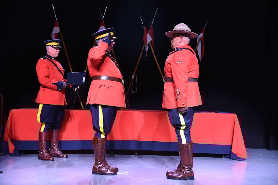 Cpl J.R. Gohn (left) from the Vanderhoof RCMP department recieves the Commanding Officer’s Citation in Prince George from Chief Superintendent Brian Edmonds, on May 29 .(RCMP photo) 