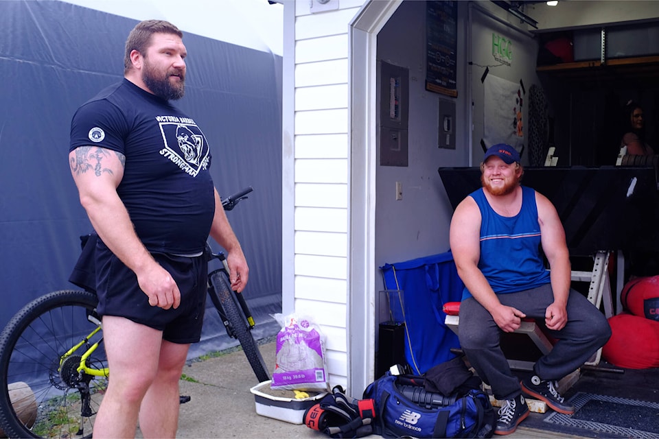 ‘B.C.’s strongest man’, Sean B. Hayes (left), alongside Kalem Nygren, will be heading to Duncan on July 1 for B.C.’s first-ever professional strongman show. The two men can be seen at Hayes’ home gym on the afternoon of June 1. (Olivier Laurin / Comox Valley Record) 