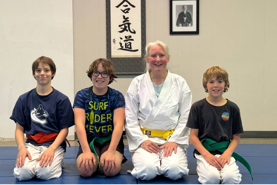 On May 30 Margot Venema received her yellow belt in Aikido after encouragement from her young friends at the dojo. (from l) Asher Cisna, Jules Dumoulin-Schaller, Margot Venema, Ryker McLarty. (Photo by: Sensei, Myrna Harrod-Taniguti) 