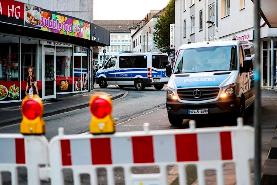 Police cars sit at a cordon early Saturday, Aug. 24, 2024, after several people were killed and injured in an attack at the Solingen’s 650th anniversary celebrations late Friday. (Christoph Reichwein/dpa via AP) 