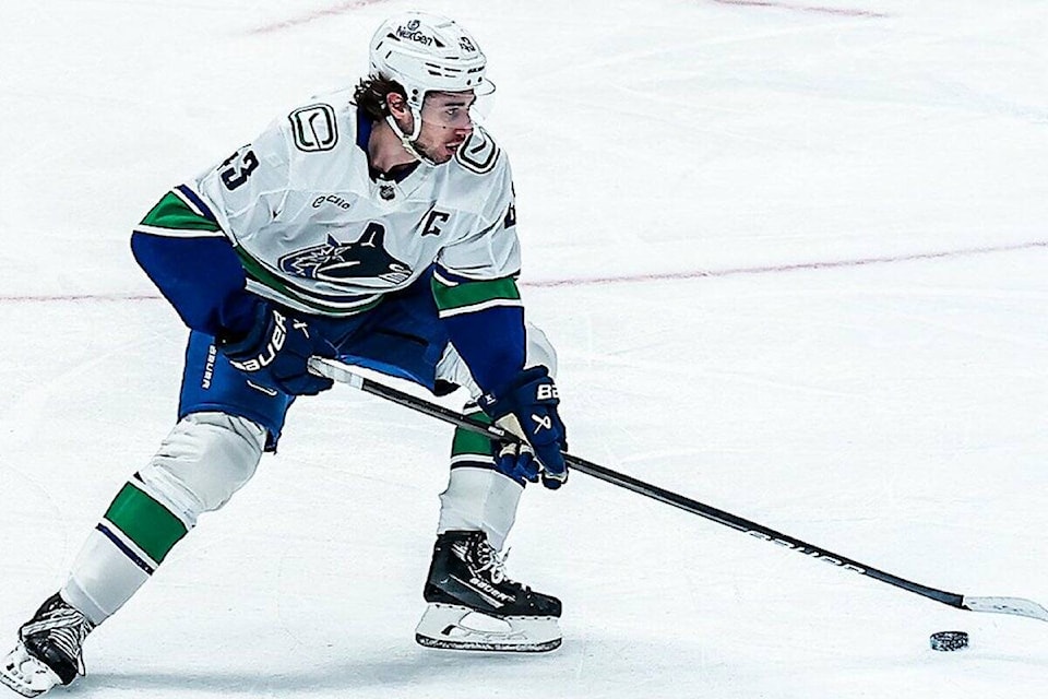 web1_250408-bpd-canucks-stars-hughes_1
