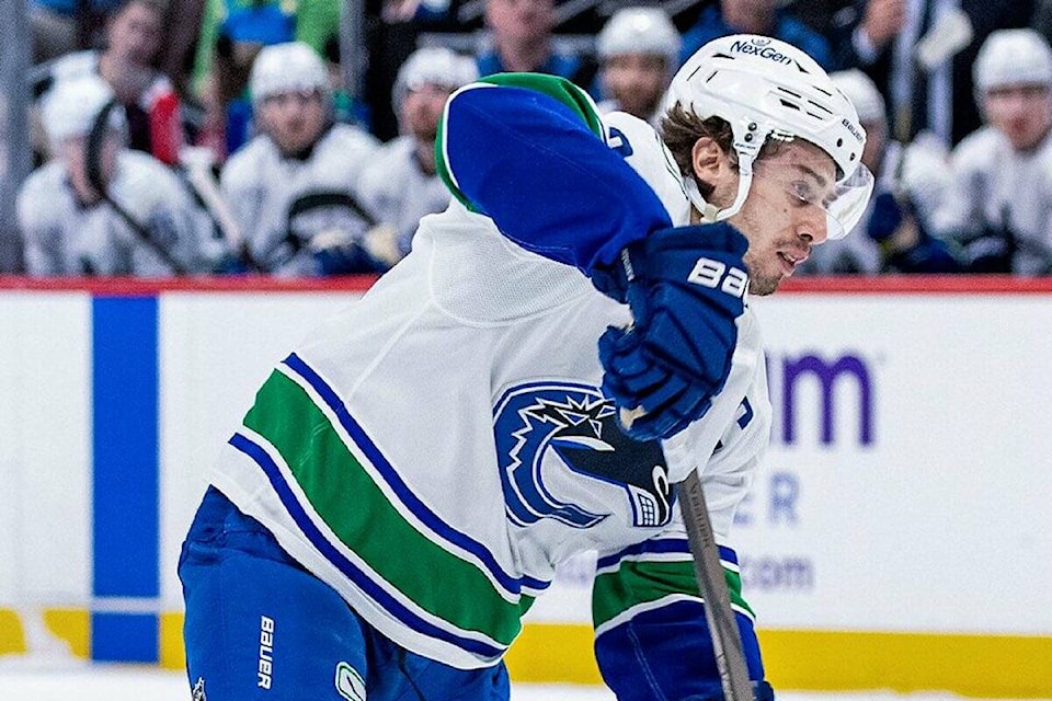 web1_250410-bpd-canucks-avs-hughes_1