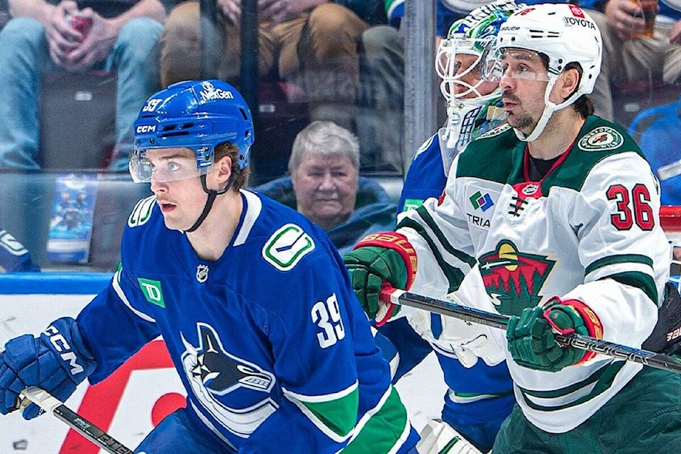 web1_250412-bpd-canucks-wild-canucks_1