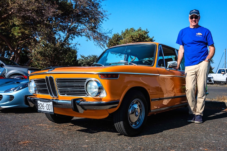 Oak Bay Car Show organizer Ron Dempsey with his favourite car.