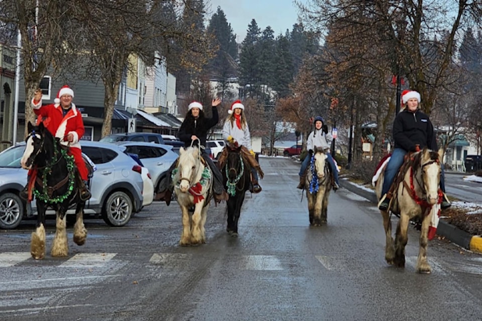 Aimee Beauchamp on Aurora, with members Jack, Emily, Paige and Bree at the holiday ride on Dec. 15.
