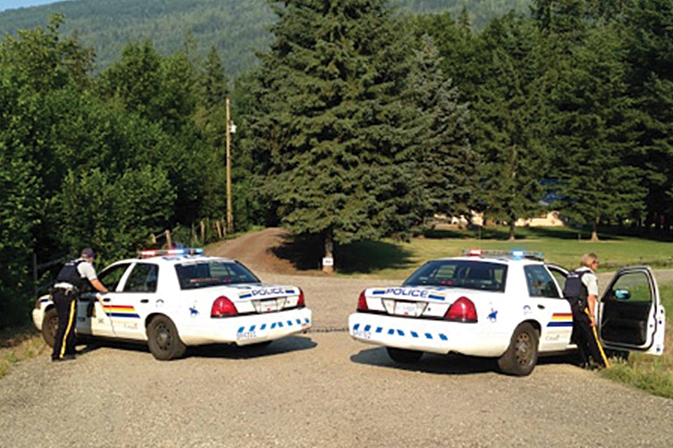 12053187_web1_180518-SAA-RCMP-block-driveway-canoe