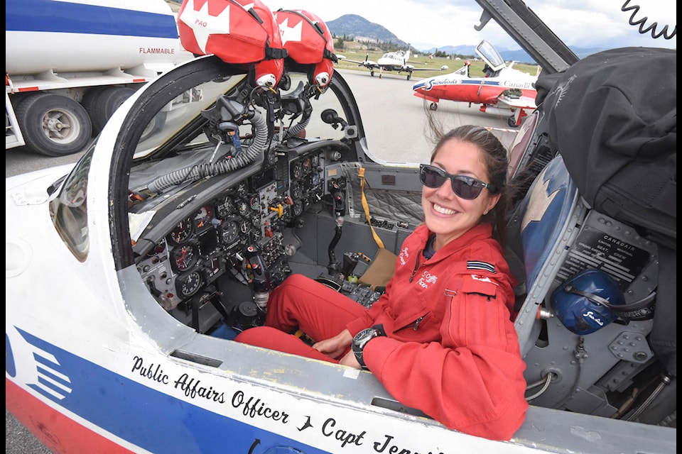 Snowbirds public affairs officer Jennifer Casey following the arrival of the first two planes Thursday morning at Penticton Regional Airport. (Mark Brett - Western News)