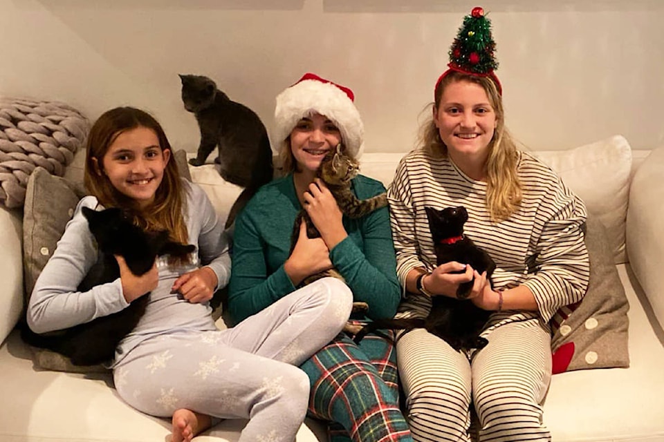 Milania, Georgia and Olivia Kwiatkowski with rescue kittens Boo, Jack, Shadow and Pumpkin. (Contributed)