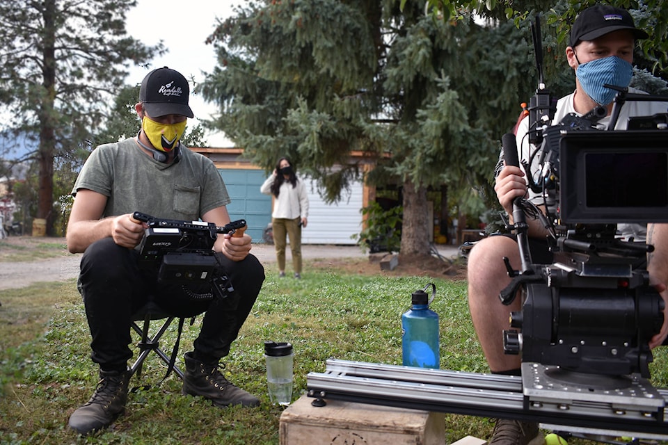 Director Connor Lang, left, looks at the display showing what cameraman Sam King is seeing during the filming of Walk With Me in Cawston on Oct. 7. (Brennan Phillips - Keremeos Review)