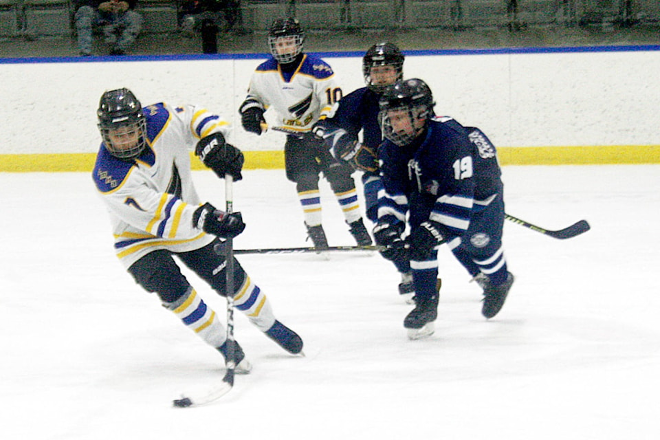 23989615_web1_180322-SUM-S-Peewee-hockey-tourney_2