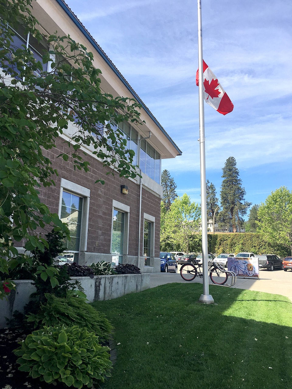 25360455_web1_210603-WIN-flags-halfmast-office_1