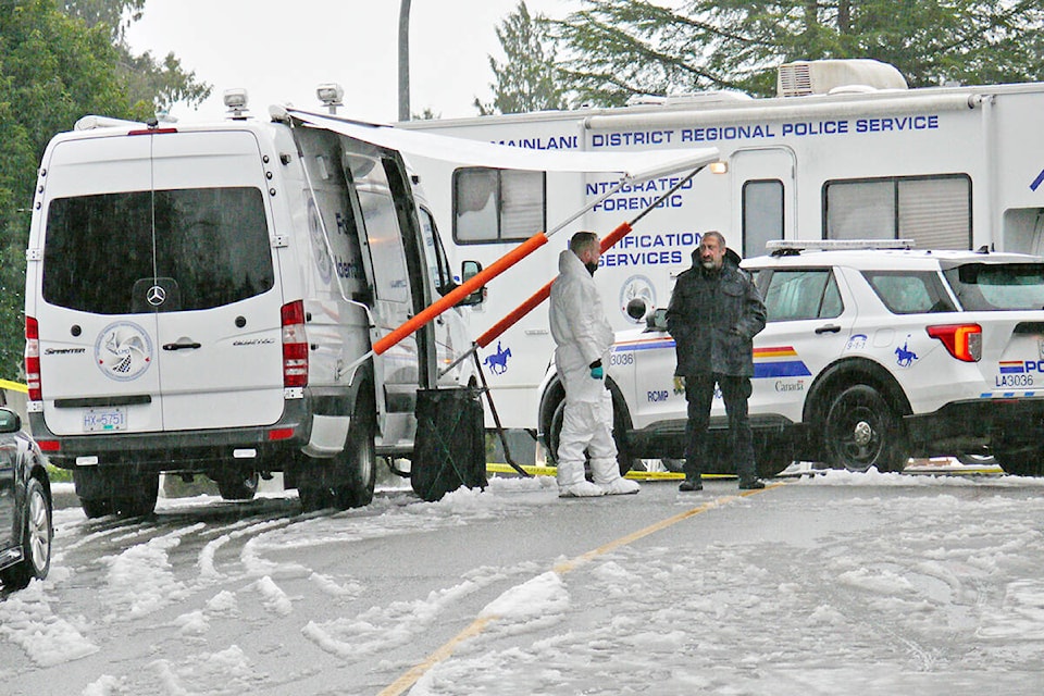Forensic investigators were on scene Saturday, Dec. 18, at the Langley City home of Naomi Onotera, the day police confirmed her husband had been arrested and charged with manslaughter. (Dan Ferguson/Langley Advance Times)